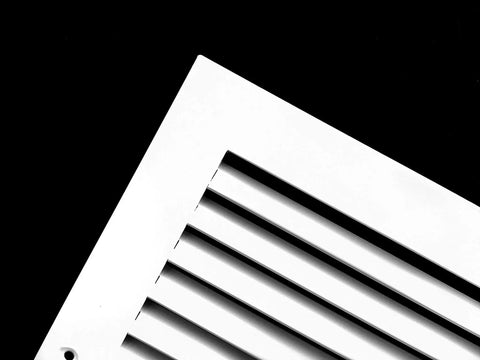 Corner view of Aluminum Return Grille for Duct Opening 26 by 8 Inches with Outer Dimensions 27.875 by 9.875 Inches, Linear Bar Design