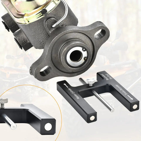 Universal Brake Booster Push Rod Adjustment Tool With Heavy Duty Magnetic Core and Quick Adjust Pins near master cylinder.