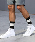 Top Shelf Black And White Piano Plate Grid Athletic Socks Engineered For The Daily Grind With Fast Dry Polyester and secure mid tube fit in use.