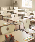 Classroom setting displaying 40 Pack Classroom Name Plates For Desks With Adhesive Dots Traditional Manuscript Alphabet 11.8x3.9 in, kid-friendly design
