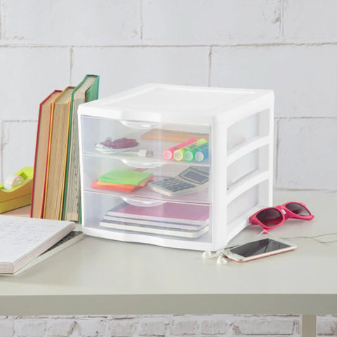 4 Pack 3 Drawer Stackable Plastic Organizer With Drawers White Frame on desk holding office supplies and books