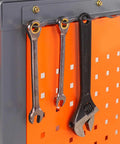 Heavy Duty Steel Workbench Garage Tool Organizer Cabinet With Pegboard And Hanging Parts Bins For Workshop Storage Includes Two Lockable Drawers showing tools on pegboard.