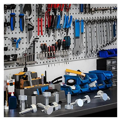 Heavy Duty Slick Quick Release Plunger Pins Featuring M6 Spring Locking Latch System For Rolling Toolboxes And Industrial Tools on workbench with assorted tools.