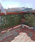 Balcony view with Expandable Faux Ivy Privacy Screen For Balcony And Patio Ideal Outdoor Fencing Panel With Realistic Artificial Hedges One Sided Leaves UV Safe Easy To Install For Instant Privacy And A Chill Outdoor Vibe installed on railing.