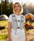 Woman wearing Ultralight Running Vest With Breathable Quick Dry Mesh Chest Pack Hydration Ready Kit for Runners while camping.