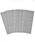Top Tier One Thousand Piece 1 1 4 Inch 18 Gauge Galvanized Brad Nails crafted for indoor carpentry, showing steel strips for framing.