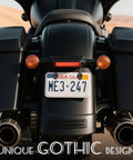 Rear view of motorcycle featuring Dope Skull License Plate Screws Kit with Gothic design for bold skeleton frame decor.