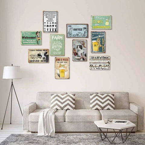 Wall with various vintage tin signs including Cheat Sheet Chart Poster Metal Tin Sign For Garage Workshop Man Cave Bar Pub Cafe