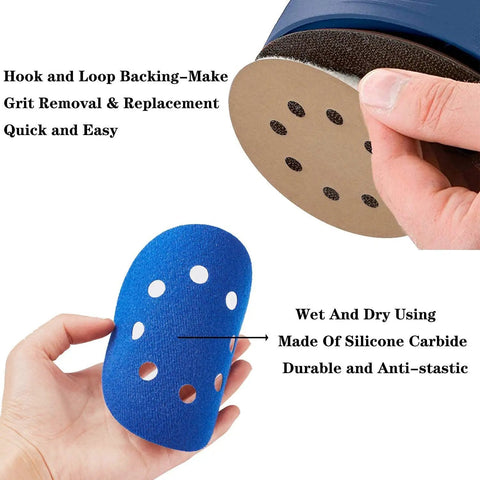 Hands holding 32 Piece 5 Inch Pro Grade Sanding Discs Hook And Loop 8 Hole Wet Dry Sandpaper Set With 2 Interface Pads