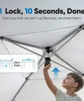 Child standing under 10x10 Pop Up Screened Canopy Tent With Mosquito Netting, Easy Up Outdoor Screen House Shelter for Patio, Camping And Picnics, Portable With Wheeled Carry Bag Included, setting up the tent by pushing the central lock mechanism.