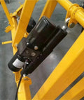 Heavy Duty Electro Hydraulic Linear Actuator With 200MM Stroke And 10000N Push Pull Force installed on a yellow frame, close-up view.