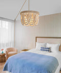 Boho Beaded Flush Mount Ceiling Light 3 Light Fixture In Rustic Antique White Wood Beads in a cozy bedroom setting.
