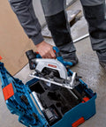Badass 18V Cordless Brushless Circular Saw With Slick Six Point Five Inch Blade shown in protective case on construction site.