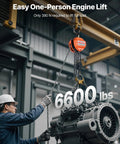 VEVOR orange hand chain hoist, 3-ton capacity with galvanized chain, lifting a large industrial motor in a warehouse.