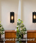 Black Wall Sconce Lighting Single Light Bathroom Vanity Fixture in modern farmhouse style, matte black metal, upward and downward view