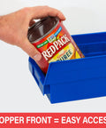 Hand placing can into blue plastic bin with hopper front for easy access, for heavy duty plastic shelf bins for garage, closet, and drawer organization, 12 by 6 and a half by 4 inches, green, 12 pack, durable, versatile storage for shelves, under sink, cabinets, and racks.