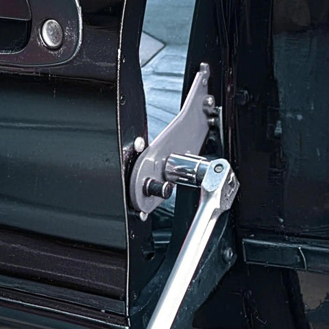 Universal Alloy Door Hinge Align Tool Pro Grade For Auto Body Repair And DIY Fixes Beefy Door Misalignment Corrector in use on car door