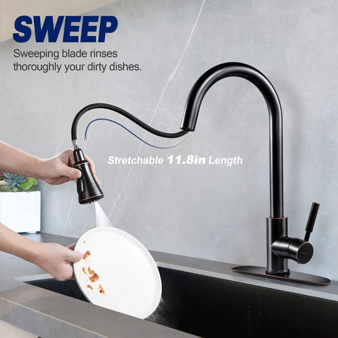 Oil Rubbed Bronze Pull Down Kitchen Faucet With Sprayer And Aquablade Sweep, High Arc Design, showing flexible hose in use