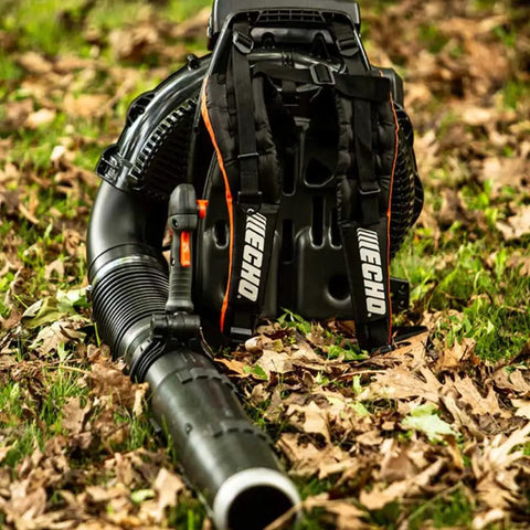 Backyard Beast Gas Backpack Blower With 220 MPH Air Speed 1110 CFM Air Flow 79.9cc 2 Stroke X Series Engine resting on grass