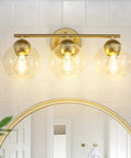 3-Light Gold Bathroom Vanity Light Fixture Over Mirror With Globe Clear Glass Shades, Dope Gold Finish Bath Lighting For Over Sink, Elevates Your Home Decor, Durable Metal Construction