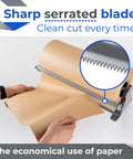 Shop Favorite 48 Inch Kraft Paper Dispenser With Smooth Cut Blade Reinforced Steel Countertop Holder For Butcher Paper And Wrap Rolls Kitchen Workhorse Top Tier Gear Set Pack Of Four with serrated blade cutting through paper.