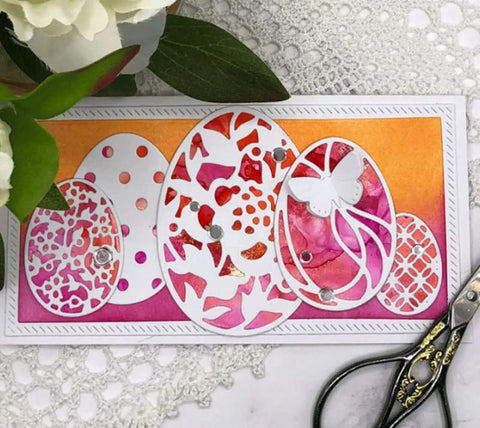 Seven Piece Easter Egg Die Cuts Set With Flower And Butterfly Frame Dies displayed on a vibrant card with decorative accents