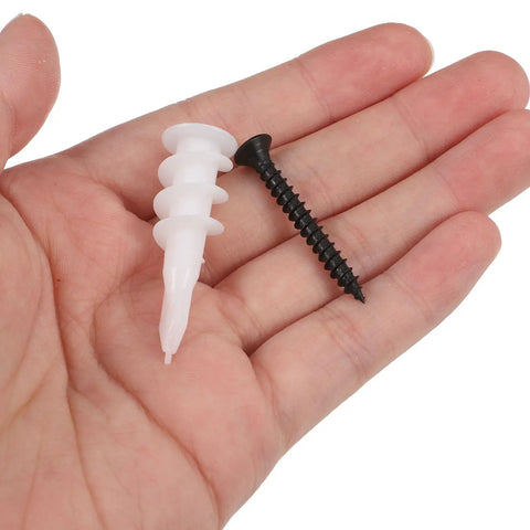 Heavy Duty Expansion Screws And White Plastic Wall Anchors Kit For Drywall And Concrete, 100 Sets With Enhanced Fixation, Stainless Steel Fasteners, Durable Mounting Accessories For Everyday DIY Projects, white anchor and black screw in hand