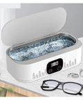 Knockout Portable Ultrasonic Cleaner For Glasses And Jewelry Using High Frequency Vibration And Eco Friendly Deep Wash Tech To Make Your Treasures Look Slick And Sparkling Fresh In Pink, with cleaning cycles displayed.