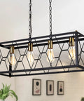 Industrial Kitchen Island Pendant Light Fixture With Black Metal Cage And Brass Gold Accents, four lights hanging in dining area