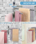 Four Arm Swivel Towel Rack Wall Mount For Bathroom And Kitchen Stainless Steel Rustproof Space Saver with towels hanging.