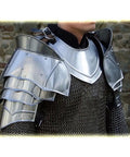 Close-up of Beefy Steel Warrior Pauldron Set Medieval Shoulder Armor with Adjustable Leather Straps, adult size, in 18 gauge steel.