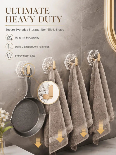 Heavy Duty Adhesive Wall Hooks With Rock Solid Grip, Hexagonal Ripple Texture mounted on tile holding towels and a pan.