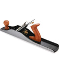 Professional Number 6 Smoothing Bench Plane Crafted From Solid Cast Iron With Precision Machined Frog And Ergonomic Bubinga Handle, angled view showcasing the handle and blade.