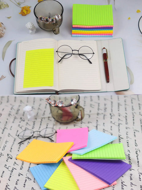 Colorful 4x6 Inch Sticky Notes, Eight Bright Colors, 320 Sheets Total Across Eight Pads, Mega Sticky Adhesive next to a notebook.