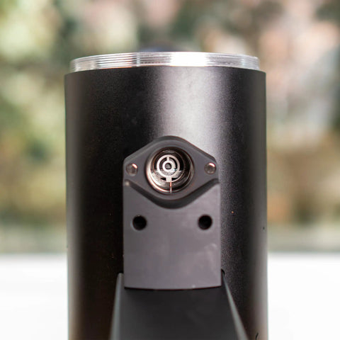 Close-up of the grinder's burr carrier on the Killer Variable Speed Single Dose Coffee Grinder Equipped With 83mm Red Titanium Flat Burrs.