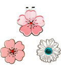 Magnetic Golf Ball Marker Set With Flower Crystal Markers And Hat Clip 10mm showing pink and white flower designs on metal