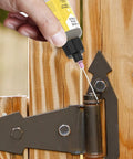 Applying Door Hinge Lubricant With 1 Oz Needle Oiler For Quick Squeak Fix On Doors, Locks, Tools, And Bicycles to a gate hinge