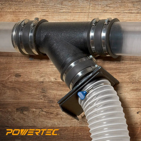 Super Handy Two And A Half Inch Dust Collection Fittings Kit with Y-fitting and blast gate on wooden workshop wall