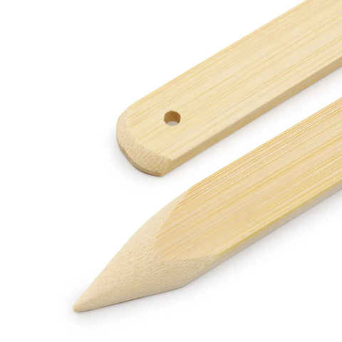 Close-up of Bamboo Point Turner And Presser Tool For Quilting And Sewing, pointed end guides stitching, Dritz 3150.