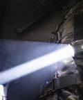 LH1 V2 LED White Light Head With Single Mode Throwing Beam For Tactical Weapon Lights in action, mounted on gear
