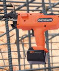 Workhorse Rebar Tie Gun 30 Mm To 60 Mm Cordless Tying Tool securing rebar on construction site with orange handheld design
