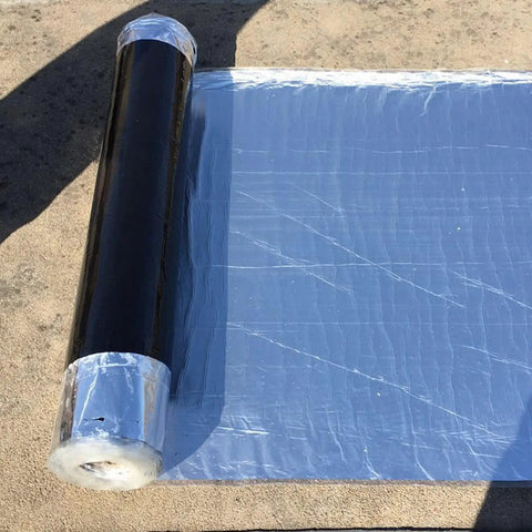 Heavy Duty Self Adhesive Roofing Tape Rock Solid Waterproof Asphalt Membrane Roll unrolled on surface, showcasing adhesive side.