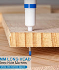 Ten Pack Pro Grade Long Nib Marker With 20mm Nib For Deep Hole Marking showing long nib in wood hole.