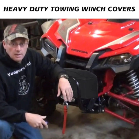 Man showing heavy duty winch cover on ATV, demonstrating the Heavy Duty Winch Cover With Drawstring And UV Resistant Waterproof Shield.
