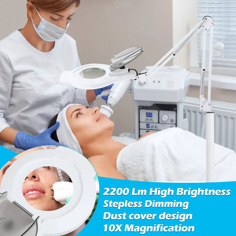 10X Magnifying Floor Lamp With 4 Wheel Rollable Base, 2200 Lumens LED Lighted Glass Lens near esthetician performing treatment.