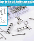 132 Piece Clevis Pin And Cotter Pin Assortment Kit in 304 Stainless Steel with 15 sizes displayed on a table with a clear box.