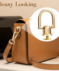 Premium Heavy Duty D Rings And Screws For Purses shiny gold metal rivet on a handbag strap with a sleek finish.
