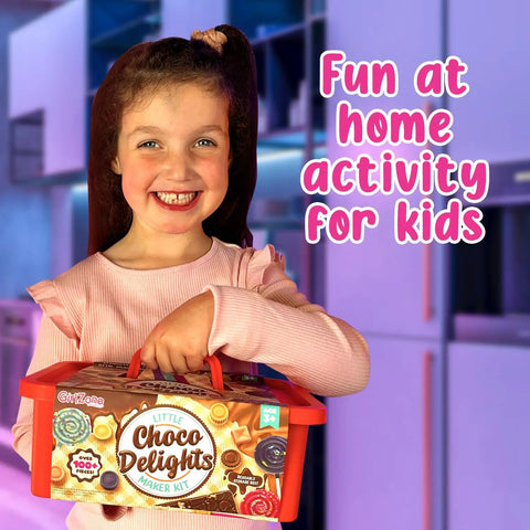 Child holding Totally Fun Chocolate Making Kit For Kids With Candy Bar Molds Lolly Sticks And Wrappers A Fun Creative Activity