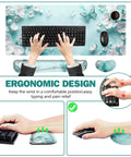 Dope Large 4 In 1 Mouse Pad Desk Pad Set With Keyboard And Mouse Wrist Rests XXL 35 By 15 Inch Non Slip Base Stitched Edges Teal Butterfly Design Includes Cup Coaster For Home Office, shown from above with hands on keyboard and mouse.