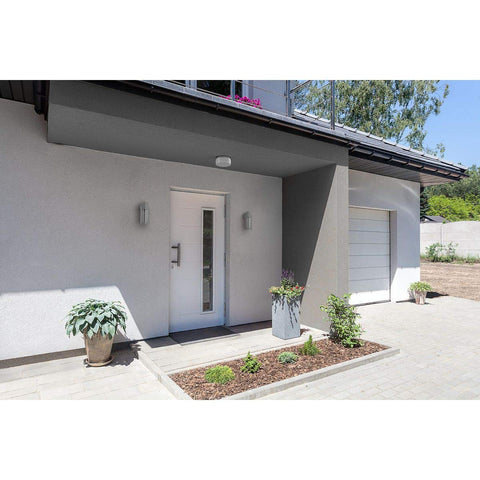 Modern Outdoor LED Sconce In Gray, Compact 12X5 Inch Wall Light on porch accentuating curb appeal and safe nighttime visibility.